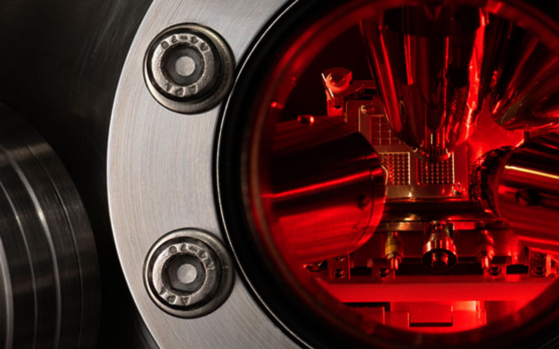 Quantum photonics device inside a laboratory measurement chamber.