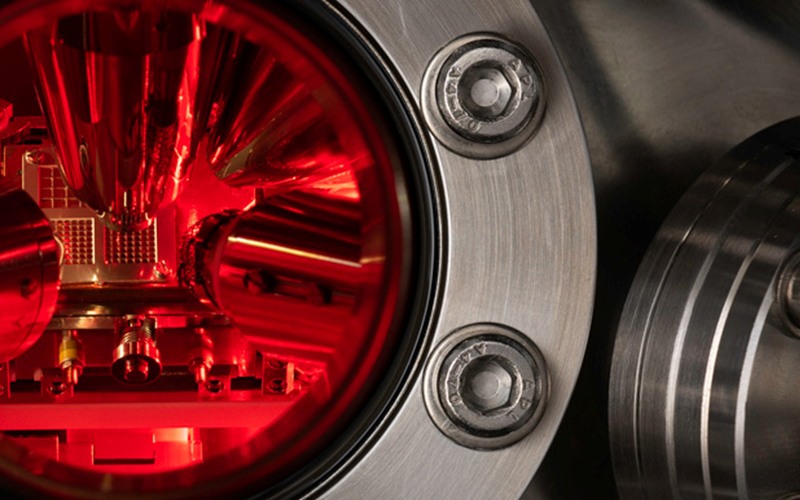 Quantum photonics device inside a laboratory measurement chamber.